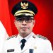 Keluar Gedung KPK, Bupati Bolmut Sirajudin Lasena Diborgol dan Berompi Oranye